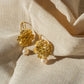 ARETES ROSETAS CON PERLA DE RÍO