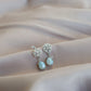 ARETES MIRZA CON PERLA DE RÍO AZUL