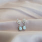 ARETES MIRZA CON PERLA DE RÍO AZUL