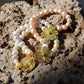 PULSERA CON PERLAS DE RÍO