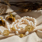 PULSERA CON PERLAS DE RÍO